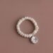 WR9a PEARL MOTIF RING